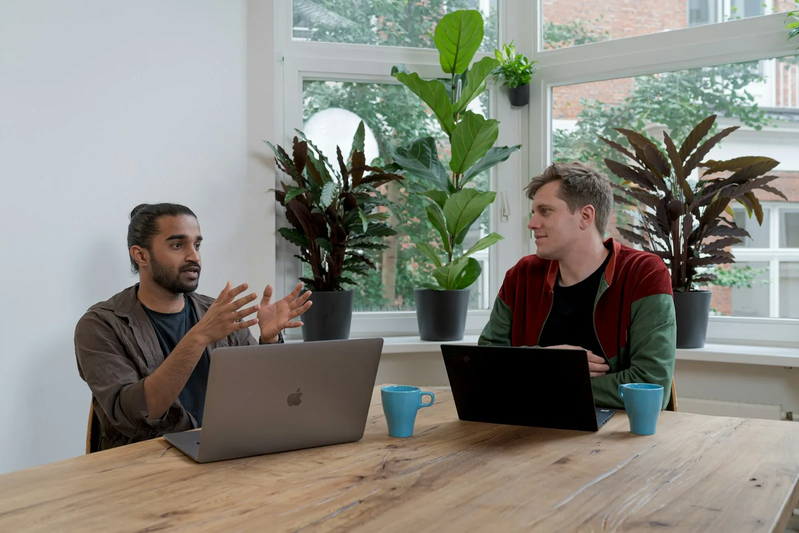 Young professional in a one-on-one coaching session on a laptop.